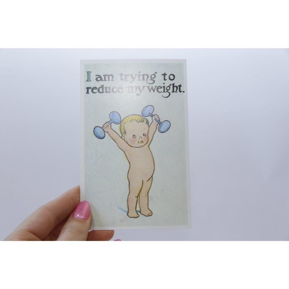 Kewpie Child with Dumbbells, I am trying to reduce my weight, 1900s, Antique
